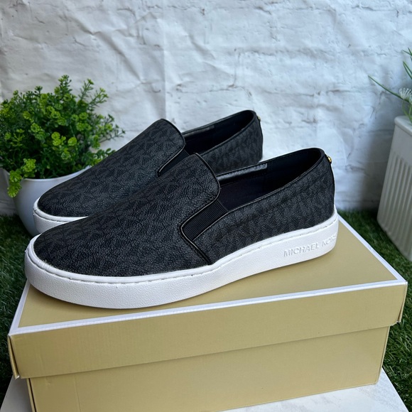 MICHAEL MICHAEL KORS
Women's Keaton Slip-On Logo
Sneakers size 7
BLACK LOGO - Picture 14 of 16